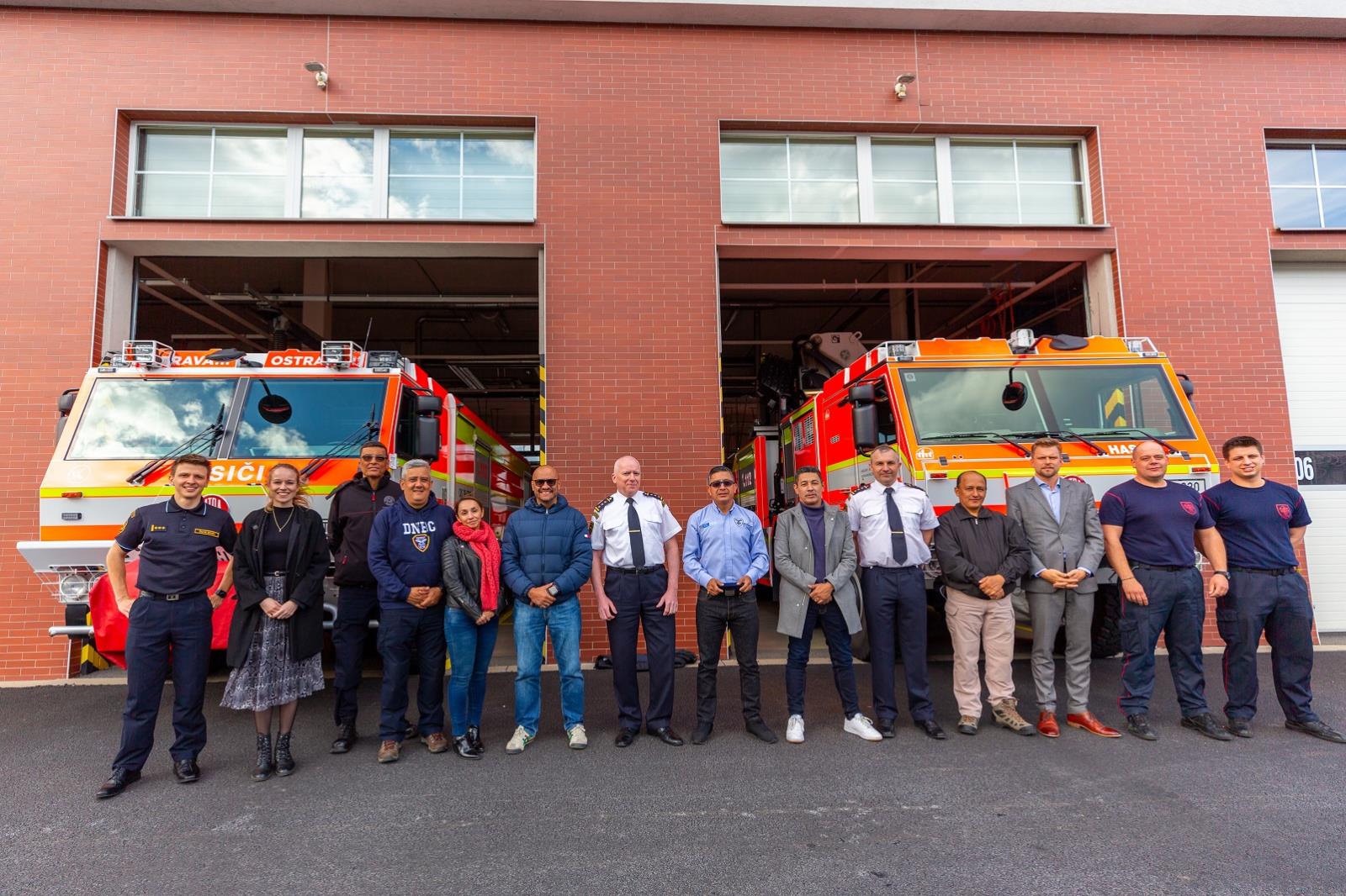 The joint photo in front of fire trucks (2).jpg